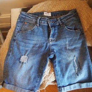 Distressed blue jean shorts